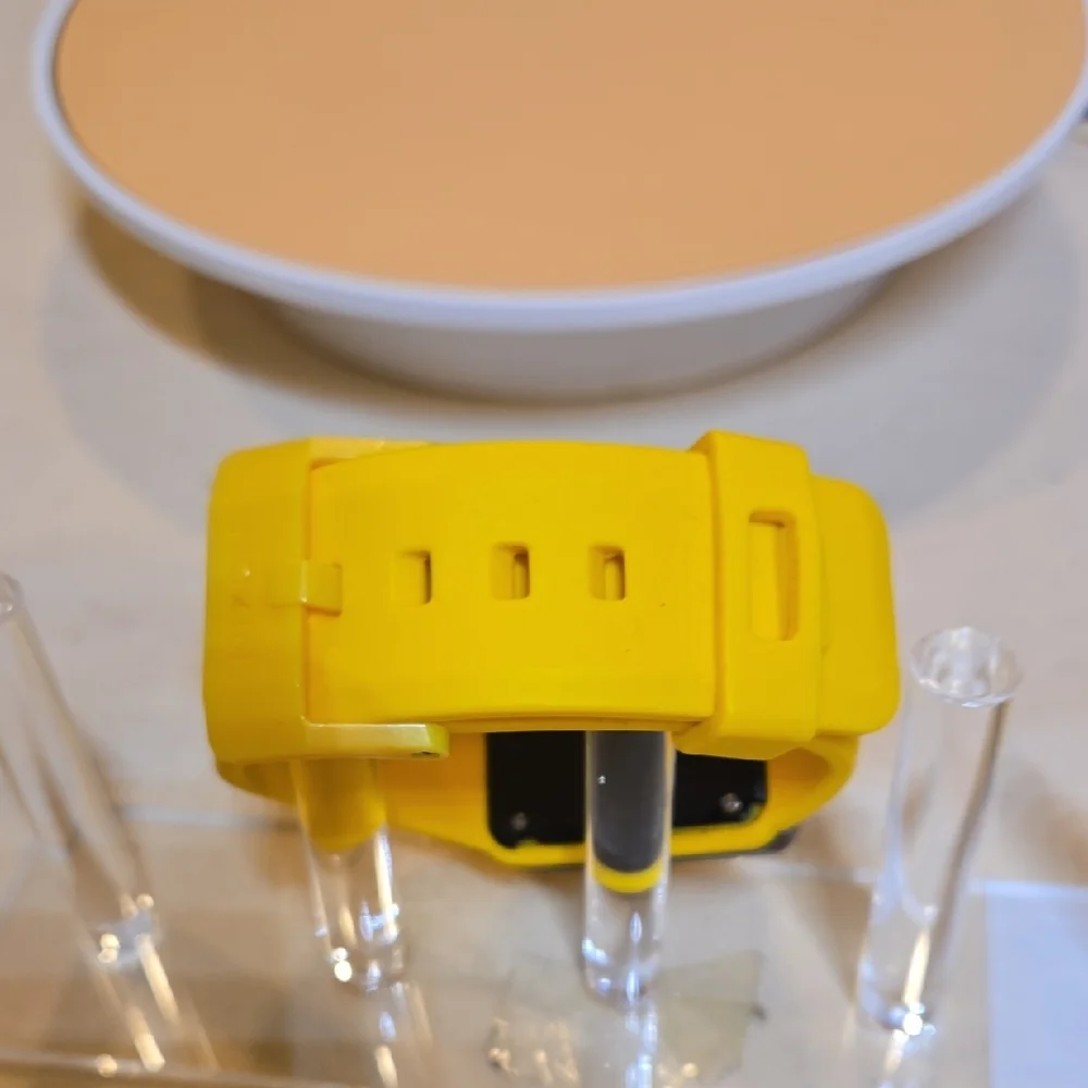 Nixon yellow smartwatch